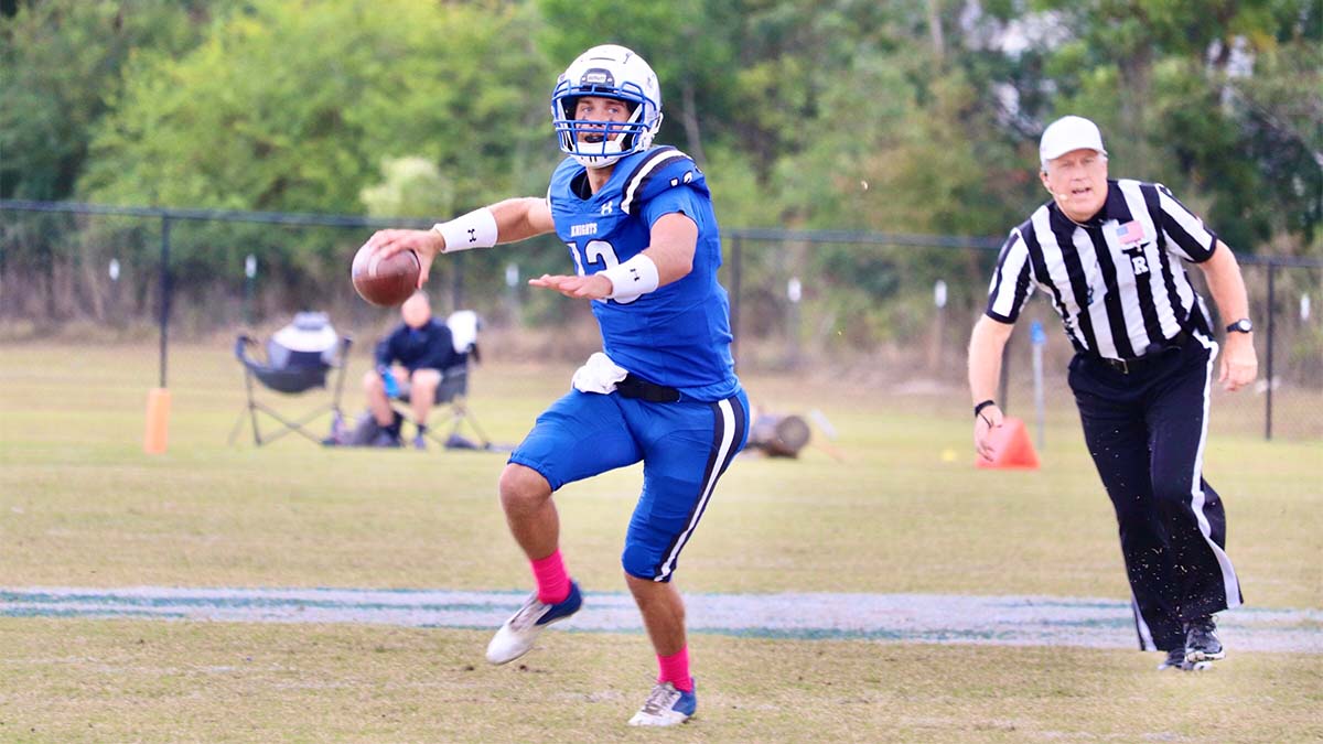 football quarterback throwing the ball