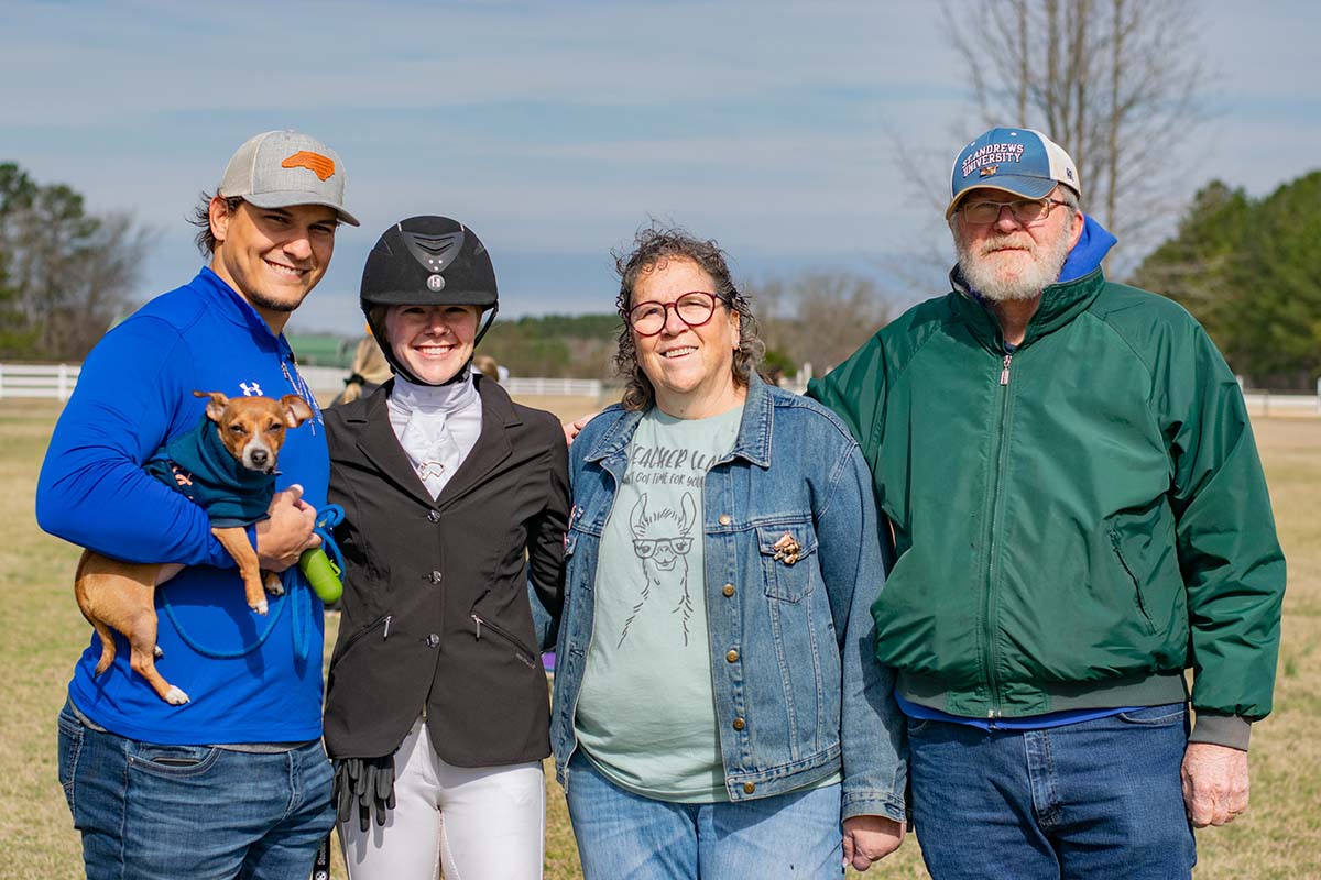 equestrian student with family members