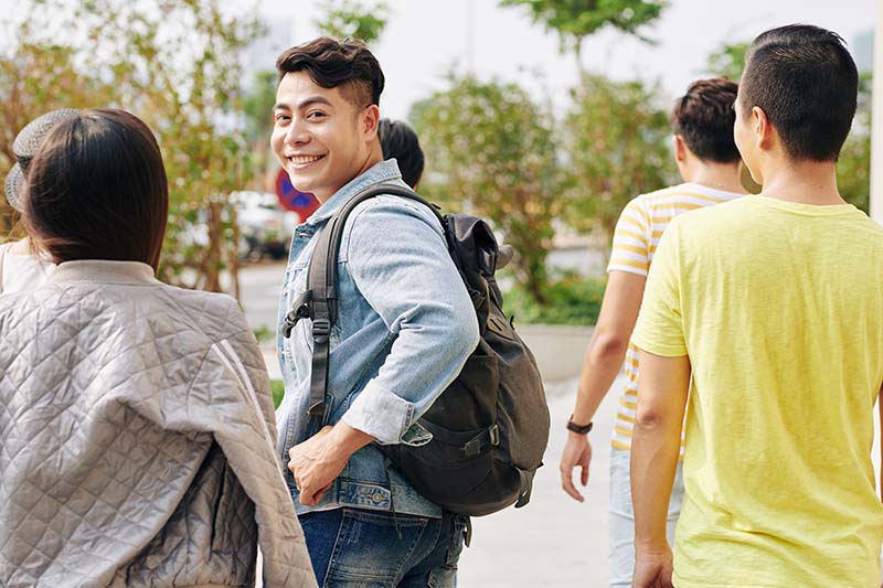 group of college students walking together