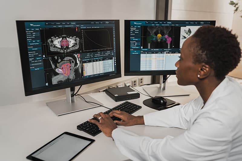 a doctor using computers