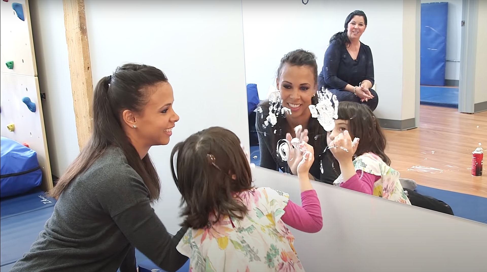 Occupational therapy graduate working with young girl