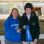 rider and mom posing with prize